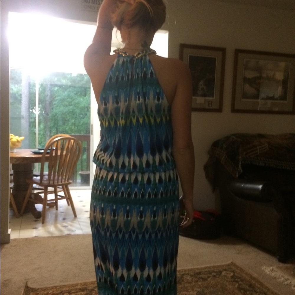 Long dress with gold chain collar